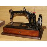 A Wheeler and Wilson MFG Co sewing machine c.1860