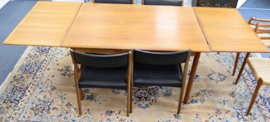 A MacIntosh teak dining table and four chairs W.229cm