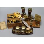 A bookslide, chess pieces, scales, silver handled servers etc