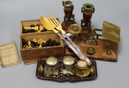 A bookslide, chess pieces, scales, silver handled servers etc