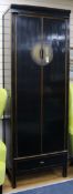 A Chinese lacquer tall wardrobe W.80cm