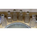 Six cut glass spirit decanters