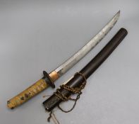 A Japanese Wakasashi, the blade with wooden hilt covered with shagreen and ito cord wrapping and