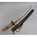 A Japanese Wakasashi, the blade with wooden hilt covered with shagreen and ito cord wrapping and