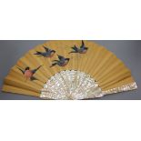 A French fan with mother of pearl sticks and painted with birds, in original retailer's box