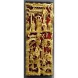 A Chinese giltwood wall panel, carved with figures length 49cm
