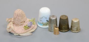 A small 9ct gold thimble, four other thimbles including Georgian.