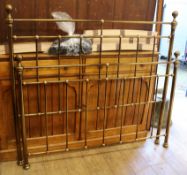 A brass framed bed W.145cm