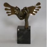 After Dali, A bronze face and hand, on marble base, height 34cm