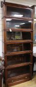 A Wernicke System Elastic serpentine mahogany six section bookcase, c.1895 stamped marks, this