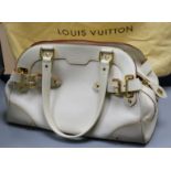 A Louis Vuitton 'Le Radieux' handbag, cream with burgundy trim and matching purse