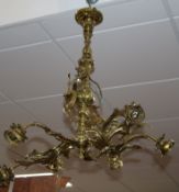 A Rococo style brass five branch electrolier