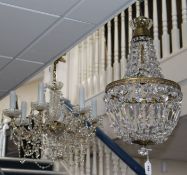 A cut glass bag shaped ceiling shade and a six branch glass drop electrolier