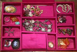 A quantity of costume jewellery and watches.