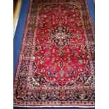 A Kashan carpet 240 x 143cm