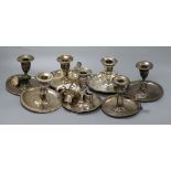 Seven assorted 19th century plated chambersticks, five odd sconces and a snuffer