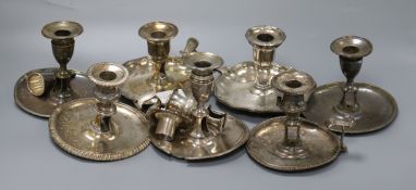 Seven assorted 19th century plated chambersticks, five odd sconces and a snuffer
