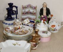 A group of decorative ceramics including a pearlware seated figure, a Limoges dessert set etc.