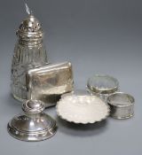 A 1930's silver butter shell with glass liner, a silver cigarette case, inkwell, etc.