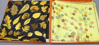 Two Hermes scarves, 'Dancing Pearls' and another with Autumn leaves on a black background,