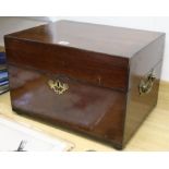 A Georgian mahogany travelling box with brass escutcheon and carrying handles and bun feet, H 32cm W