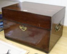 A Georgian mahogany travelling box with brass escutcheon and carrying handles and bun feet, H 32cm W