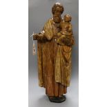 A Continental polychrome wood figure of St. Christopher, possibly 15th/16th century height 68cm