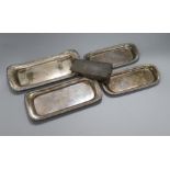 Four Sheffield plate snuffers trays and a dish wedge Largest 23cm x 10cm wide