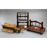 An early 19th century mahogany reel stand and two silk / wool winders Tallest 20cm.