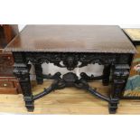 A 19th century carved oak centre table W.109cm