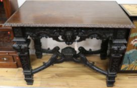A 19th century carved oak centre table W.109cm