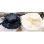 Two Lock & Co., London ladies' designer hats in original boxes, one black, one straw-coloured