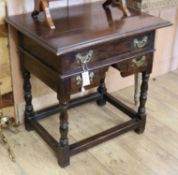 An 18th century and later oak lowboy W.73cm