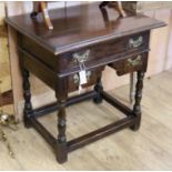 An 18th century and later oak lowboy W.73cm