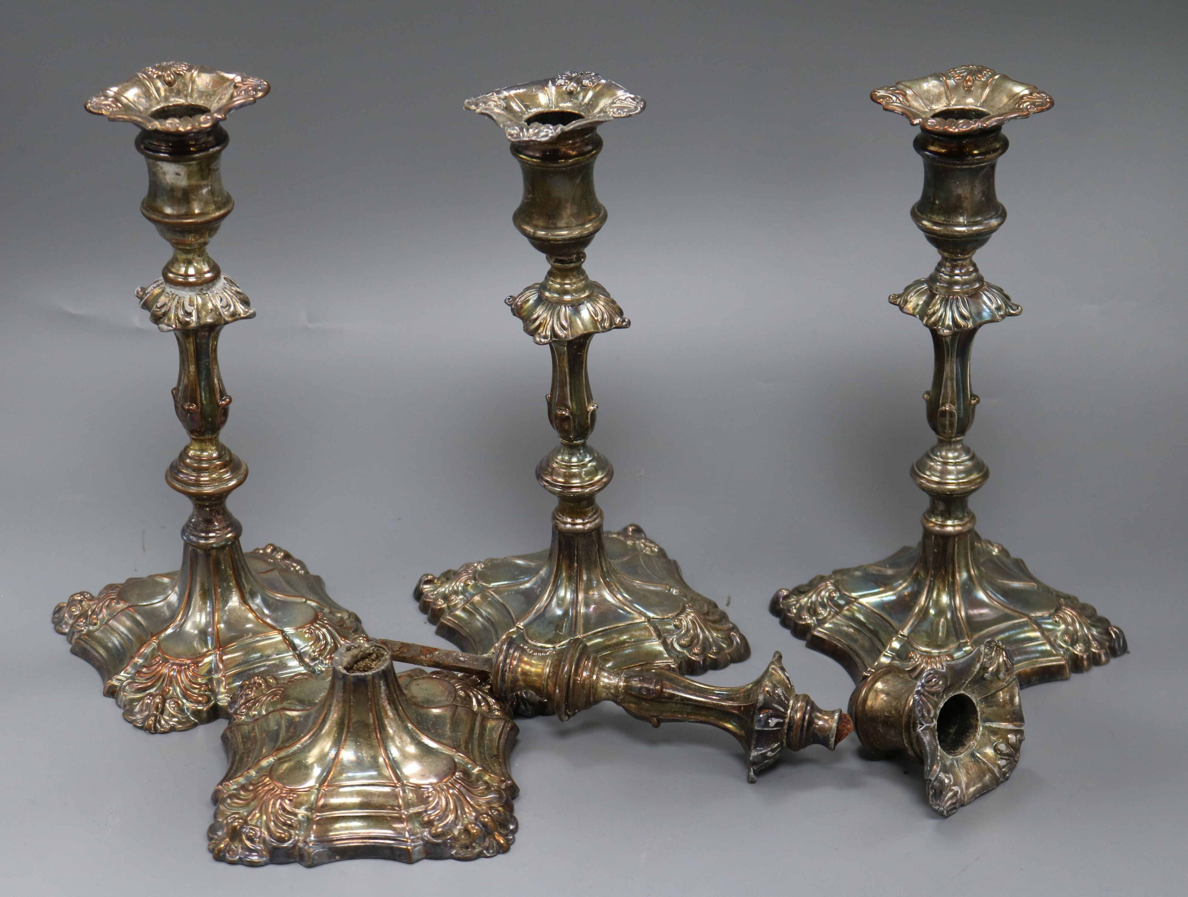 A set of four electroplated candlesticks
