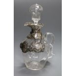 An Edwardian silver mounted glass claret jug & stopper, William Comyns, London, 1909 and two wine