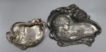 A WMF Art Nouveau plaque of a lady in a sunrise and another similar smaller plaque