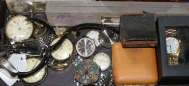 A group of assorted wrist watches and pocket watches.