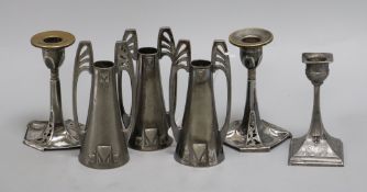 Three WMF Secessionist style candlesticks and a pair of similar candlesticks and another (6)