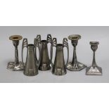 Three WMF Secessionist style candlesticks and a pair of similar candlesticks and another (6)