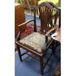 A set of six Hepplewhite style mahogany dining chairs, with drop in tapestry seats (four single, two