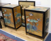 A pair of Chinese lacquered cabinets and a lacquered panel W.55.5cm and 61cm