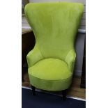 A pair of modern lime velvet high back armchairs