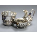 A Danish white metal brandy pan, a similar cream jug, a silver bowl and one other bowl.