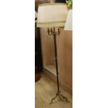 A brass three light standard lamp W.37cm