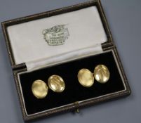 A pair of 18ct gold oval cufflinks.
