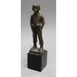After Morath, a bronze figure of a young boy smoking a cigarette, signed, on black marble base, H