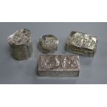 Four embossed silver trinket boxes, various, including a rectangular box decorated with musicians,