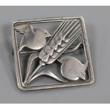 A Danish Georg Jensen sterling silver 'two robins and wheatsheaf ' brooch, no. 250, 36mm.