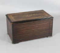 A late 19th century Swiss marquetry inlaid rosewood and simulated rosewood twelve air musical box,